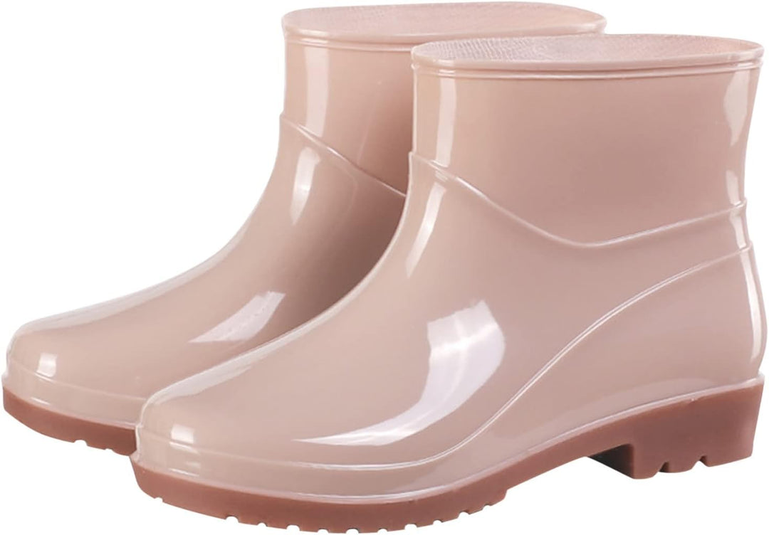 Nude short ankle rain boots with glossy finish and low heel