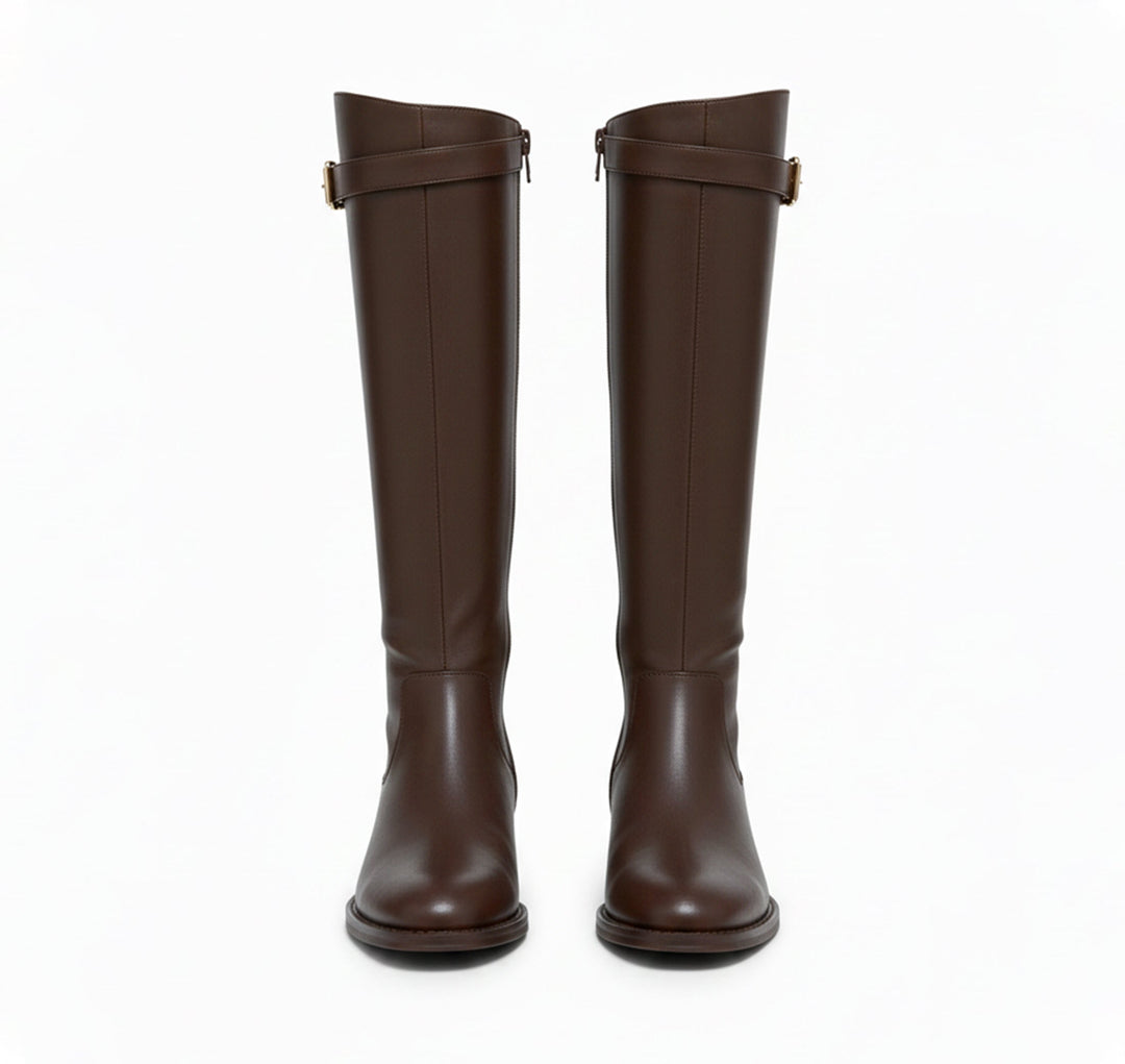 Front view of the brown riding boots showing the side zipper