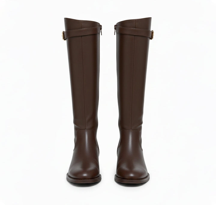 Front view of the brown riding boots showing the side zipper