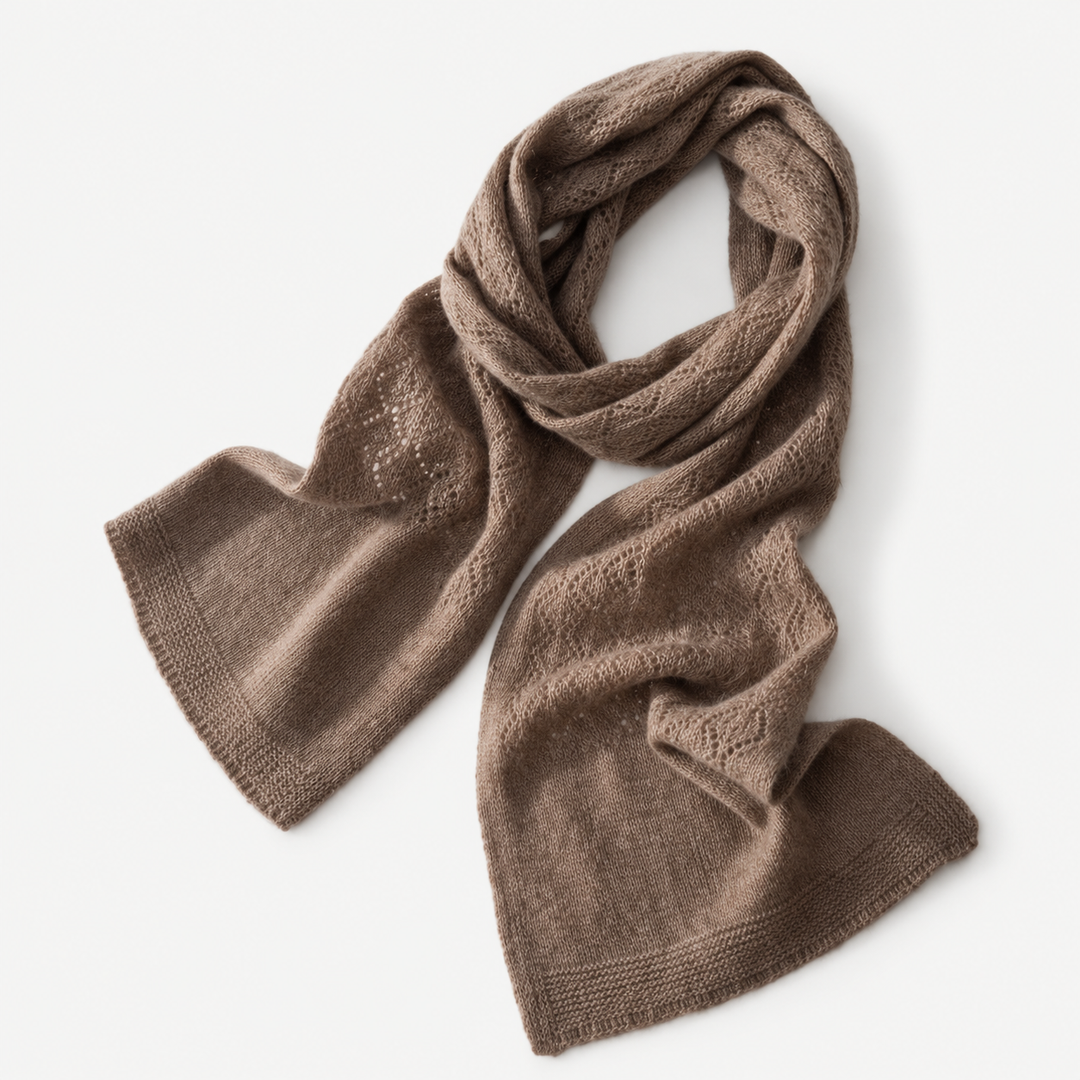 Brown long knit scarf laid flat with textured pattern