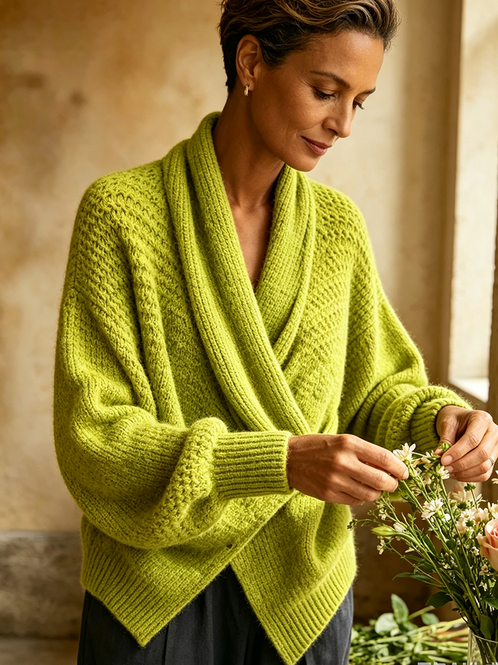 Lime shawl collar sweater detail while picking flowers