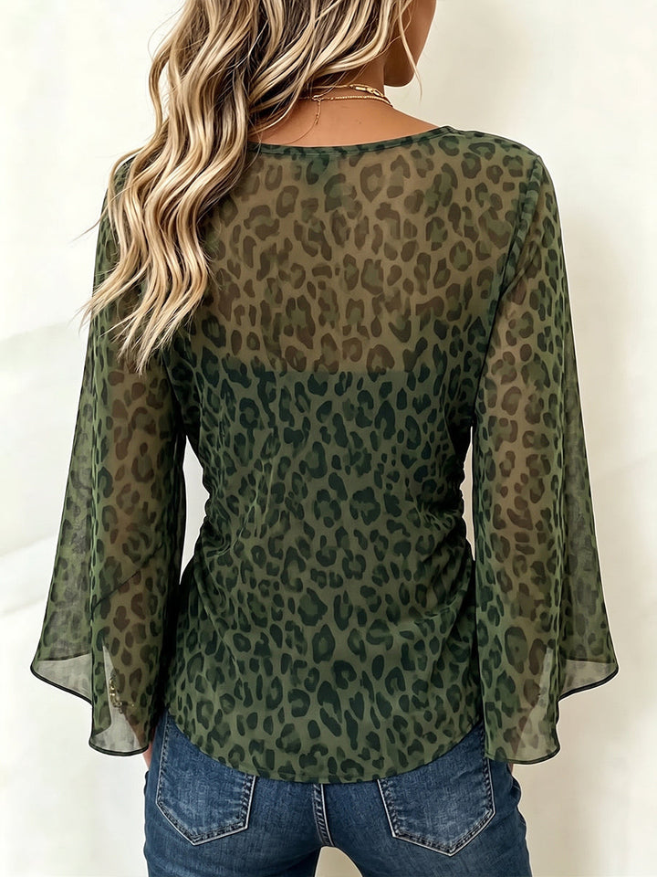 Back of the olive leopard blouse showing the sheer flared sleeves