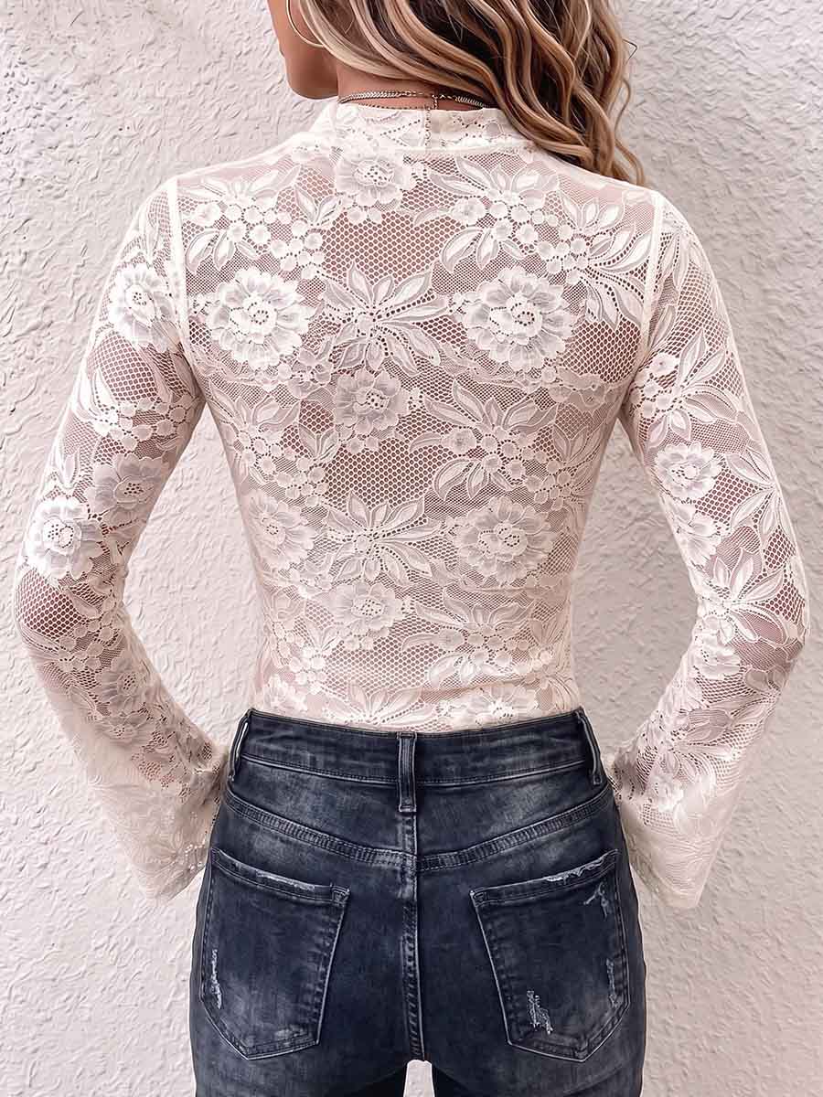 Back of the ivory lace top with flared sleeves and sheer floral pattern
