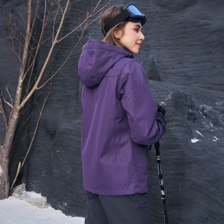 Back view of the dark purple jacket with the hood up