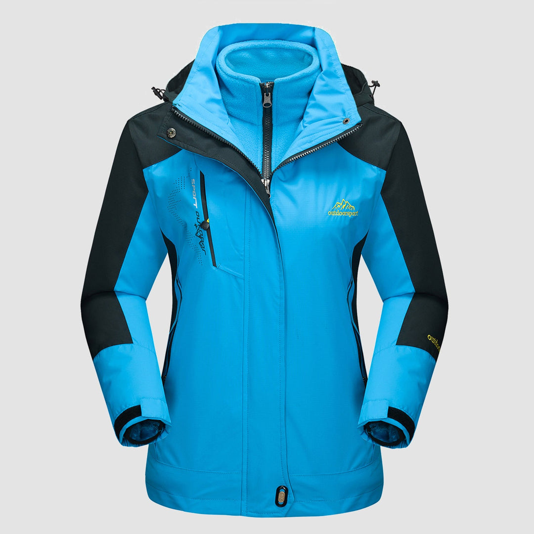 Sky blue ski jacket with black shoulder panels and hood