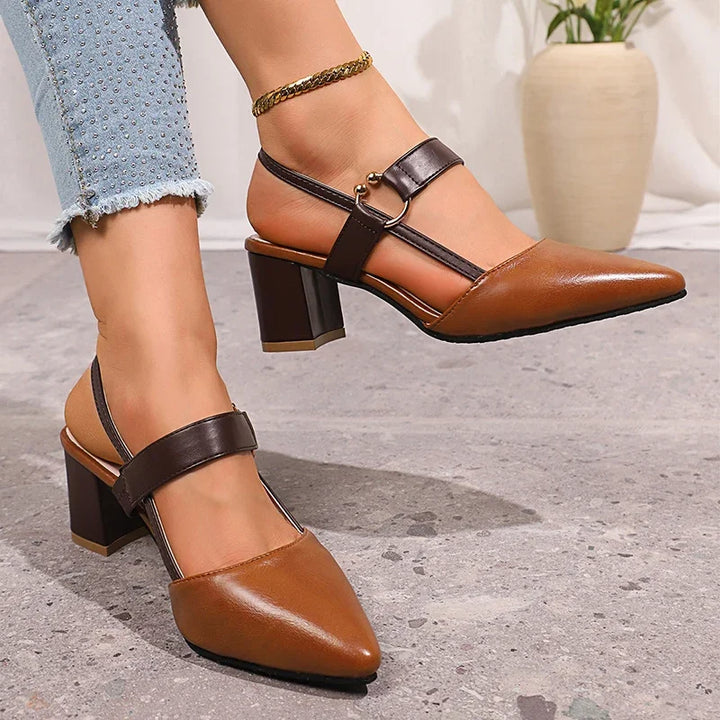 Cognac block heel slingback pumps seen from behind with brown ankle strap