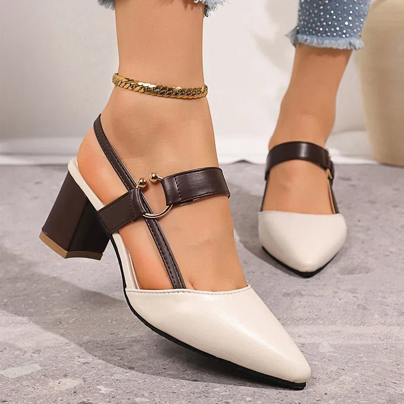 Side view of cream slingback block heel pumps with brown ankle strap