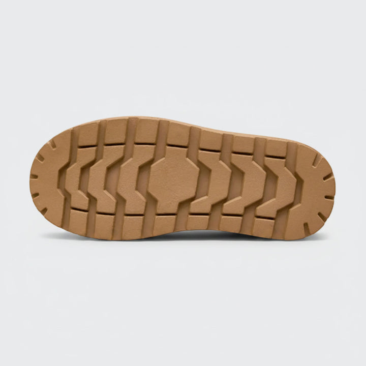 Camel snow boot outsole with chunky tread pattern