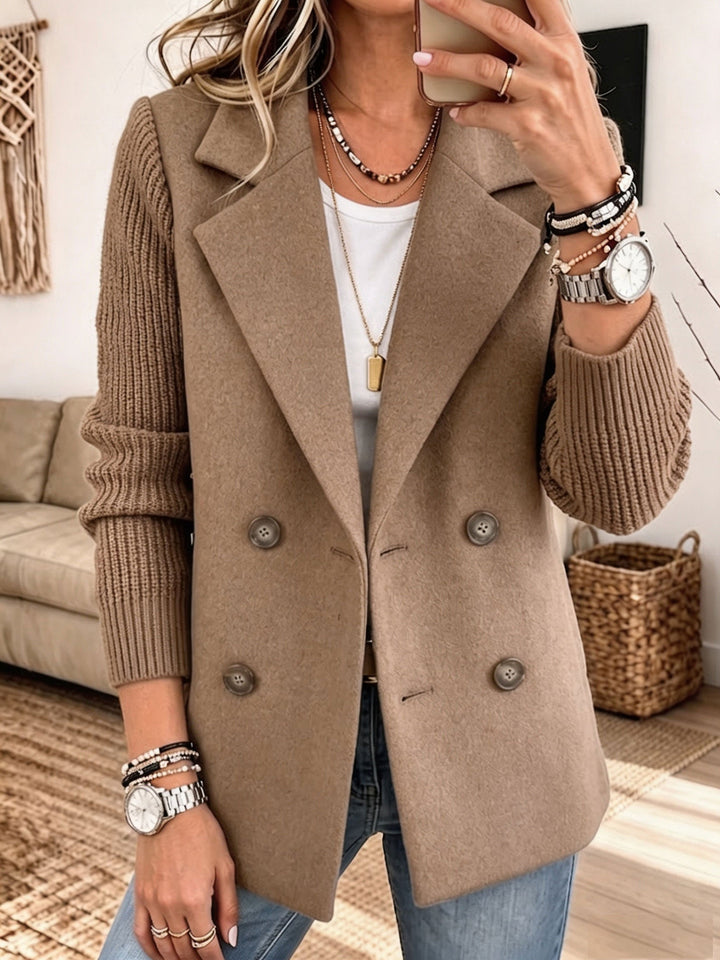 Camel knit sleeve blazer worn open over a white top