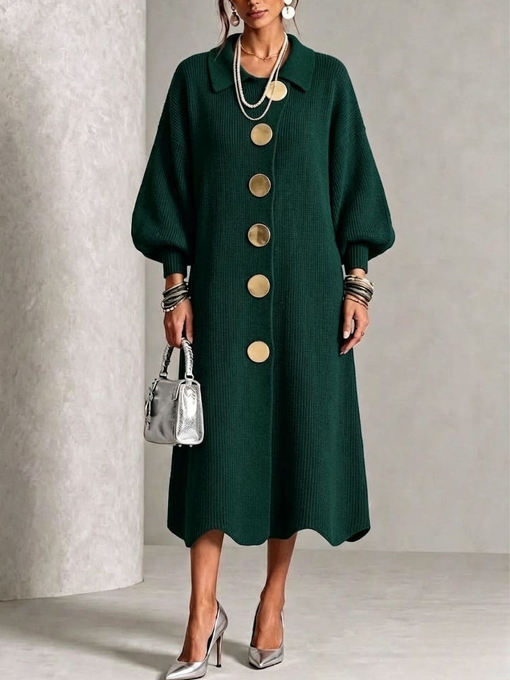 Dark green button down midi sweater dress with gold buttons on a model, front view