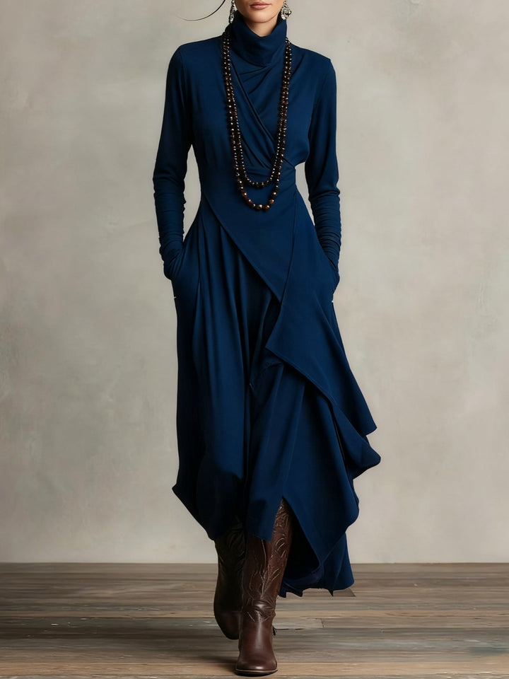 Navy turtleneck maxi sweater dress with draped asymmetric skirt, front view