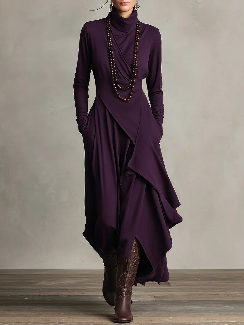 Plum turtleneck maxi sweater dress layered with a beaded necklace, front view