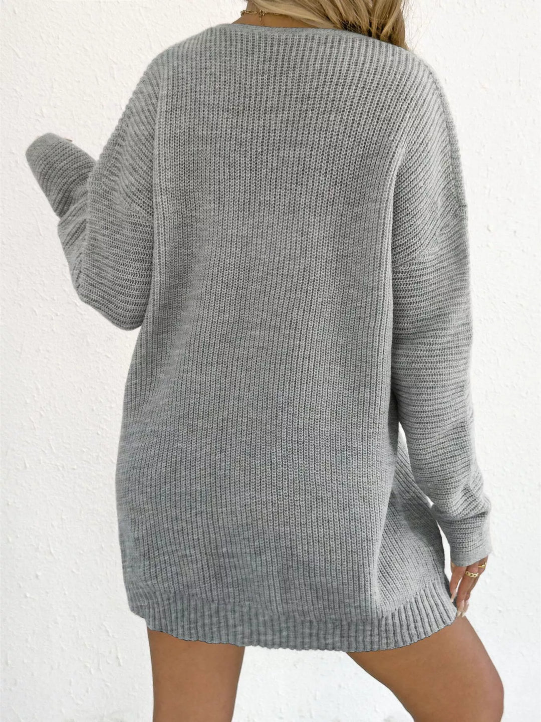 Back view of the heather gray sweater dress with dropped shoulders