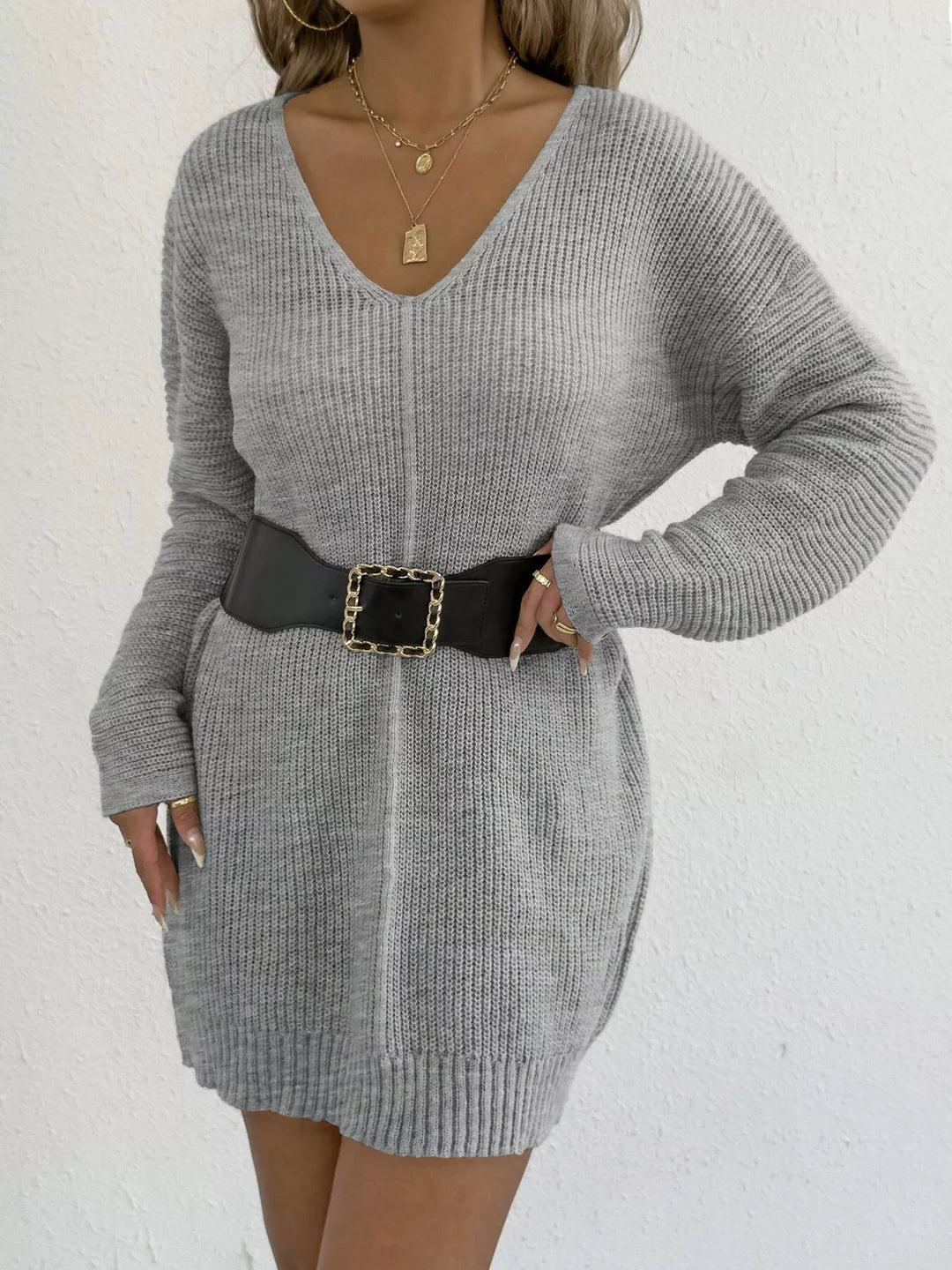 Heather gray sweater dress cinched with a wide black belt