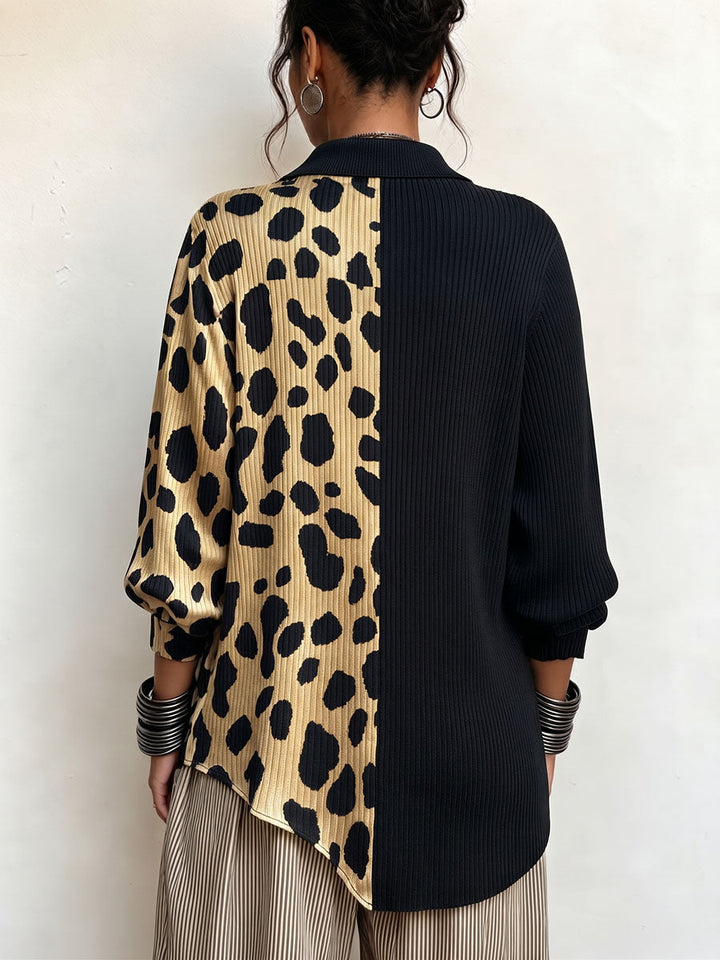 Back of the sweater split into leopard print and black ribbed knit