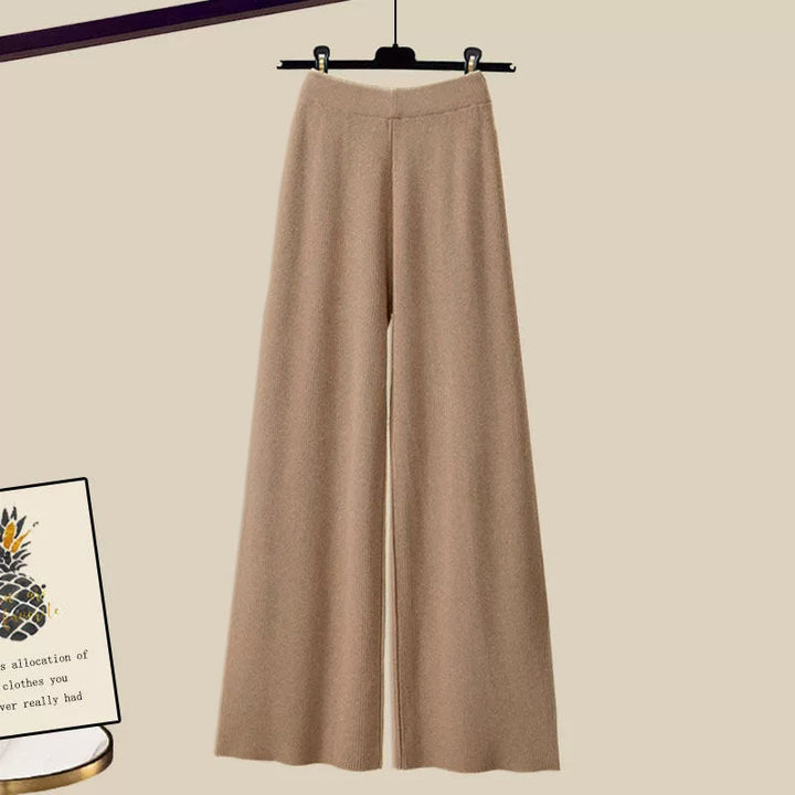 Camel knit wide leg pants with elastic waist, front view on hanger