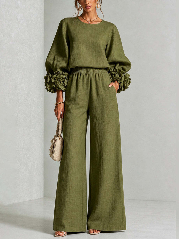 Olive green sweater set with ruffle cuffs and wide leg pants, front view