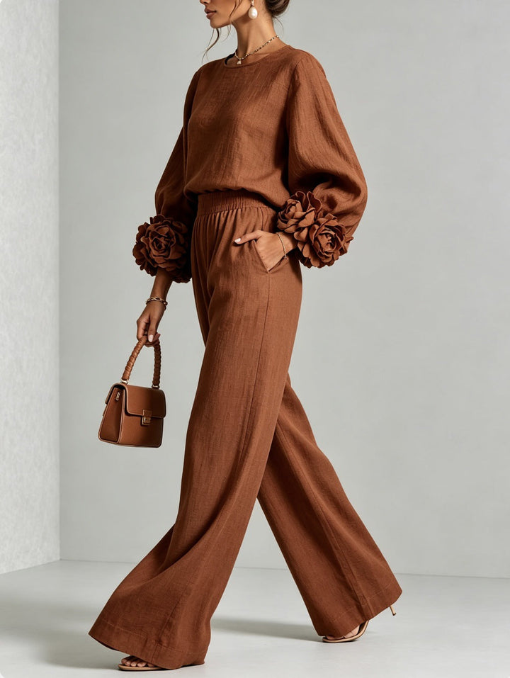 Rust sweater set in a walking pose with a matching brown handbag