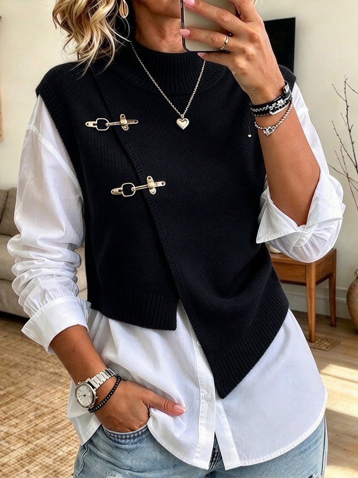 Black sweater vest with asymmetric clasp front and white shirt
