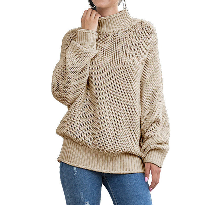 Beige oversized turtleneck sweater with ribbed hem