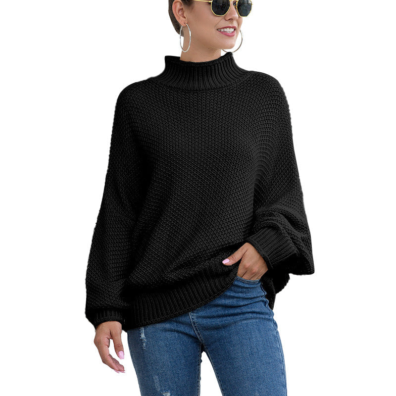 Black oversized pullover worn loose