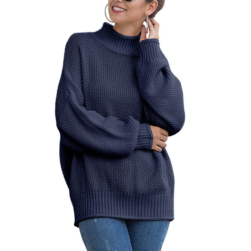 Navy oversized sweater with ribbed cuffs, arm folded