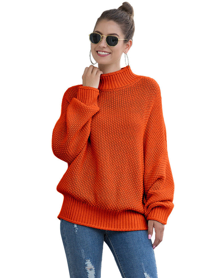 Orange oversized turtleneck worn with sunglasses
