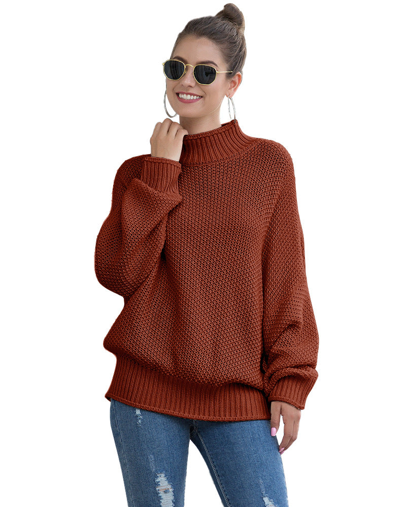 Rust turtleneck sweater worn with a hair bun