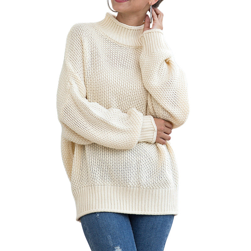White turtleneck sweater with a soft cream tone