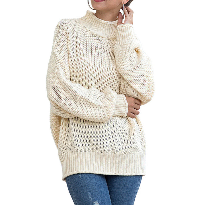 White turtleneck sweater with a soft cream tone