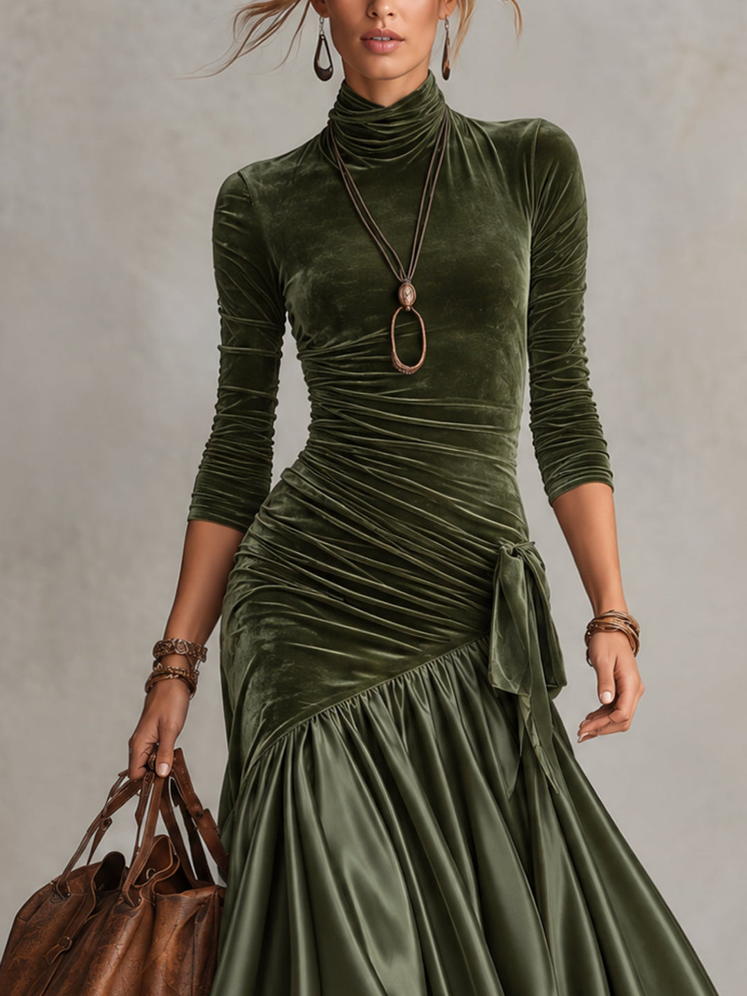 Close-up of the olive ruched mock neck bodice with side tie detail