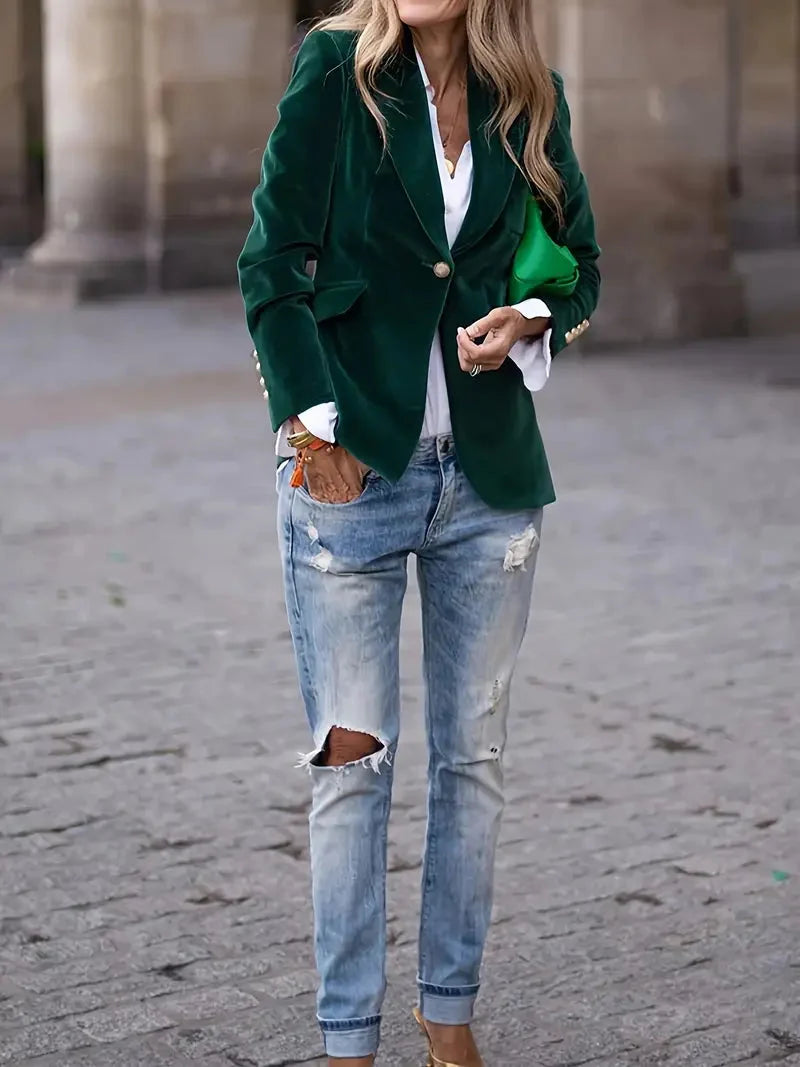 Emerald green blazer styled with ripped light denim