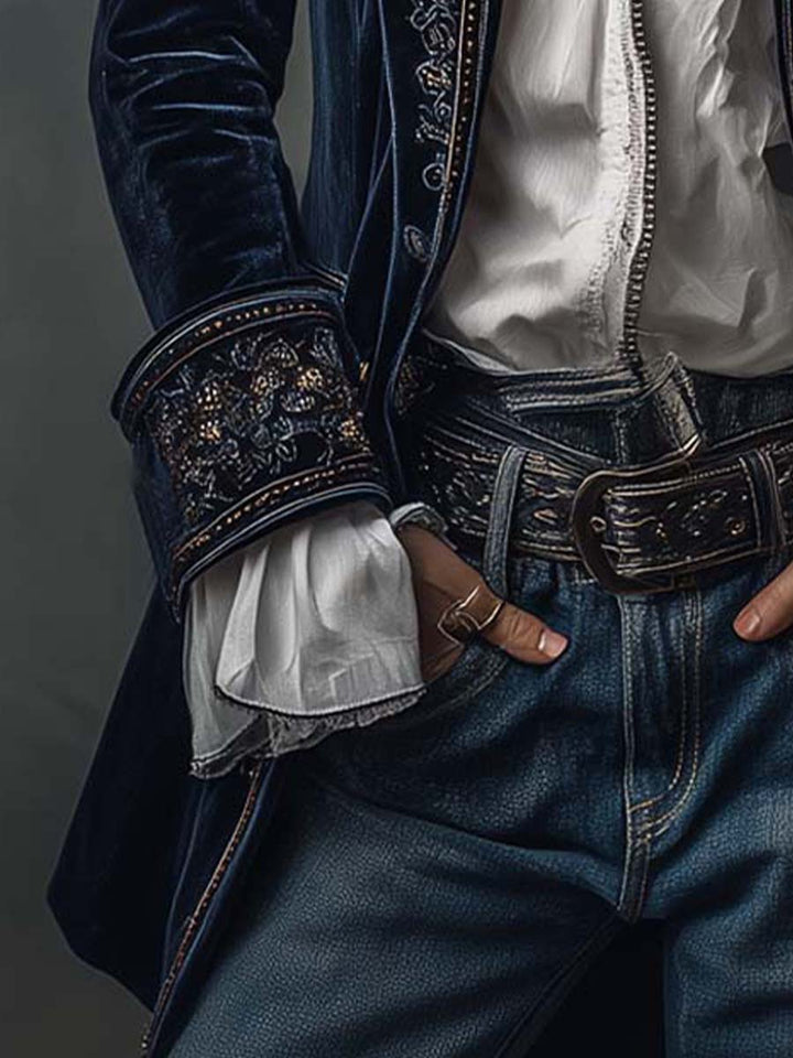 Embroidered cuff and belt detail on the navy velvet-look jacket