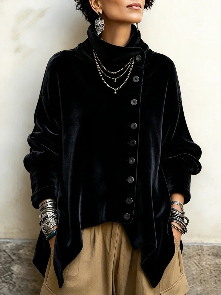 Black velvet-look turtleneck top with a row of buttons down one side