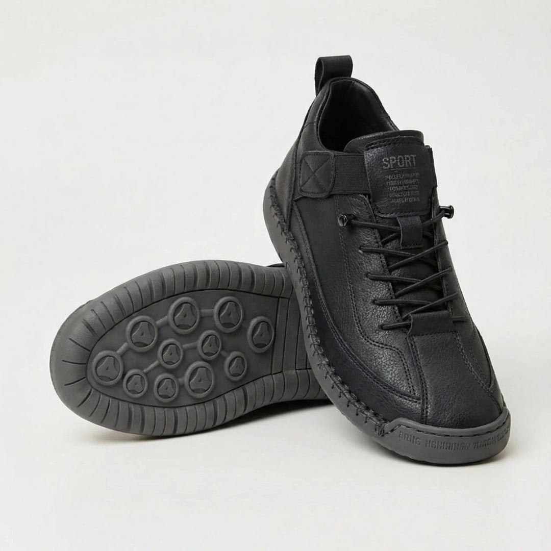 Black wide toe walking shoes with elastic laces, shown with the gray tread sole