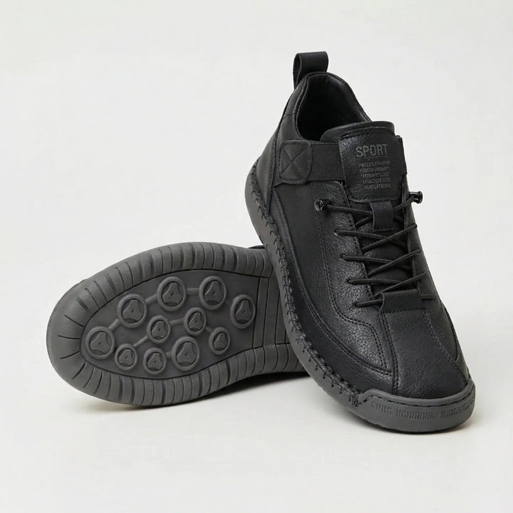 Black wide toe walking shoes with elastic laces, shown with the gray tread sole