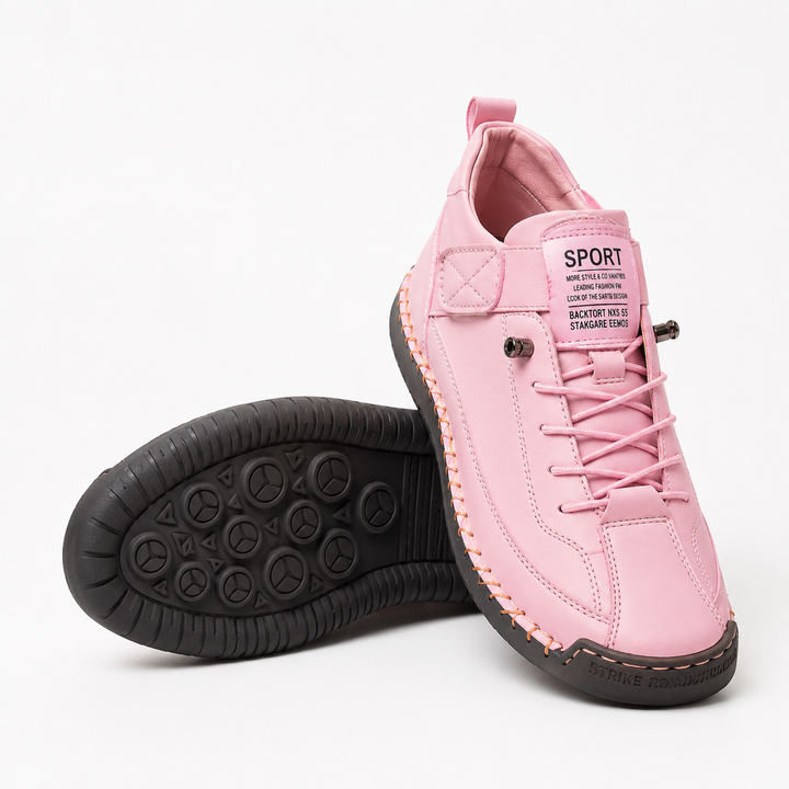 Pink wide toe walking shoes with elastic laces, shown with black tread sole