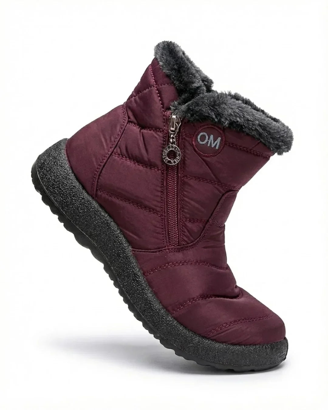 Burgundy zip ankle boot with faux fur cuff and chunky sole, angled view