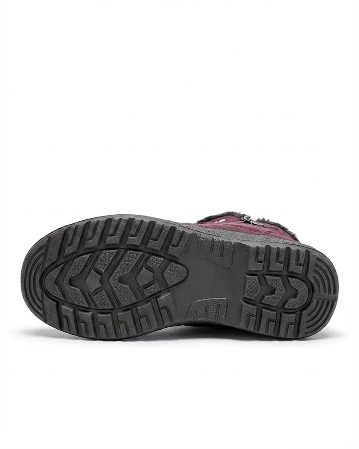 Rubber tread sole of the burgundy ankle boot