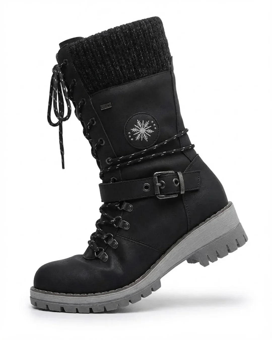 Single black lace up hiking boot with knit cuff, buckle strap and gray sole