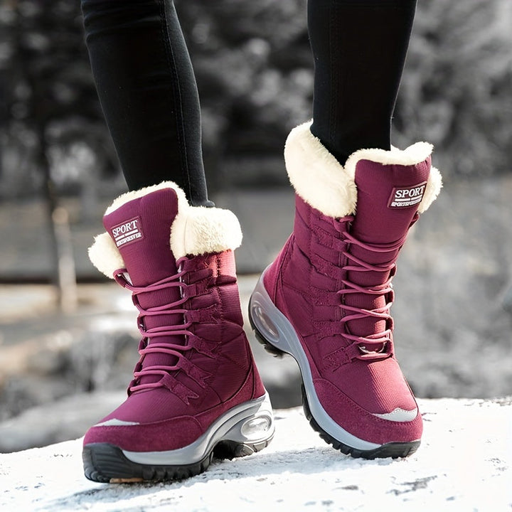 Burgundy lace up boots with plush collar, worn while walking outdoors