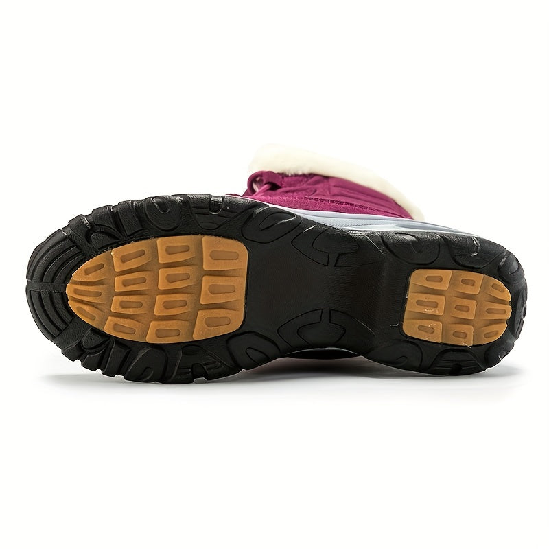 Underside of the boot showing the tan lugged tread of the sole