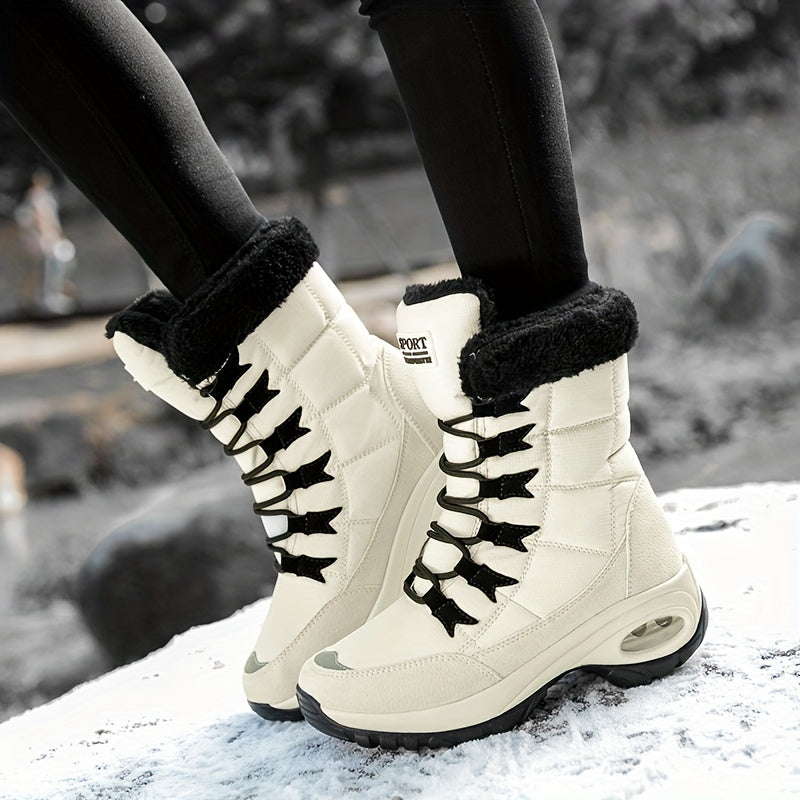 Pair of cream platform boots with black plush collars, worn while walking