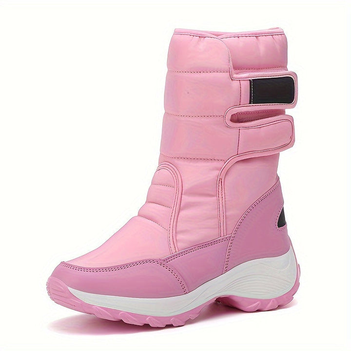 Pink quilted mid calf boot with double straps and chunky white sole