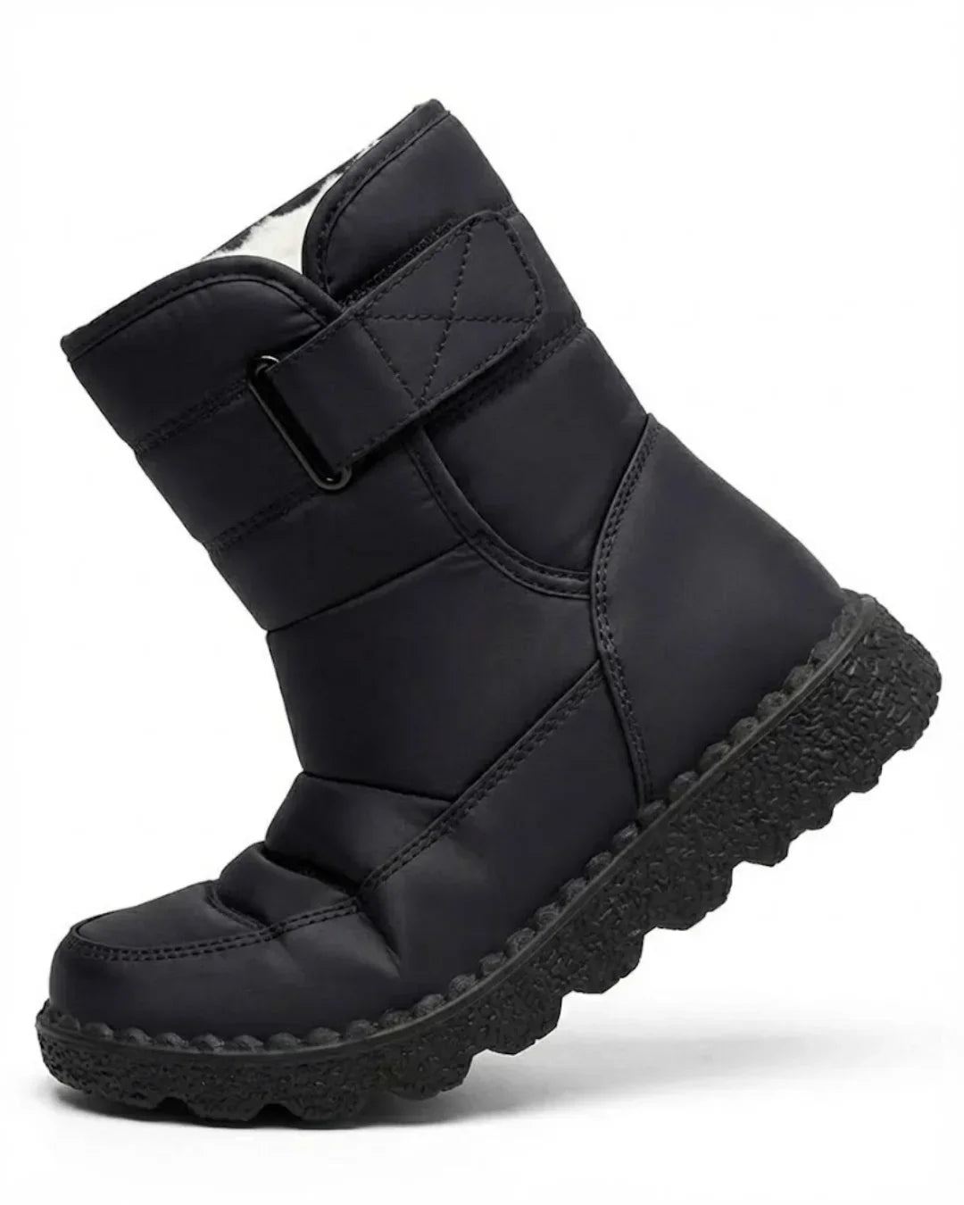 Black quilted pull on boot with wide hook and loop strap, angled view