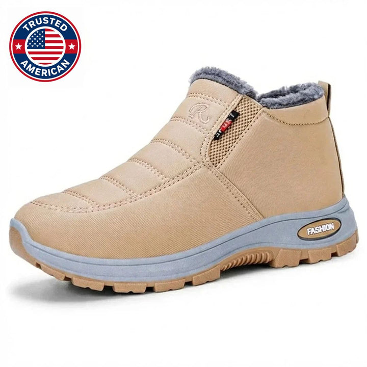 Beige suede-look slip on ankle boot with gray sole and fur lined collar