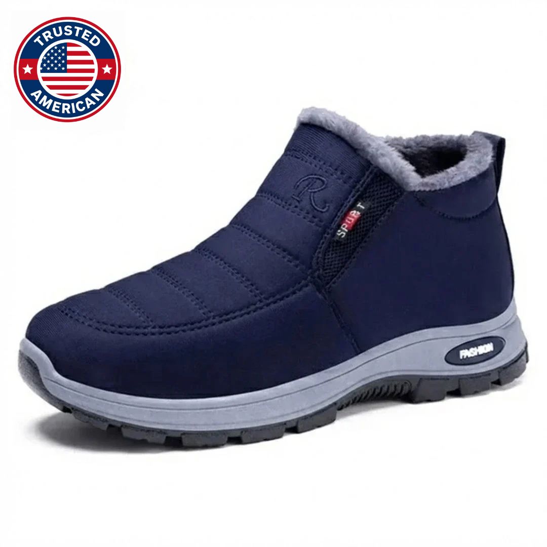 Navy quilted ankle boot with faux fur cuff and zipper pull tab