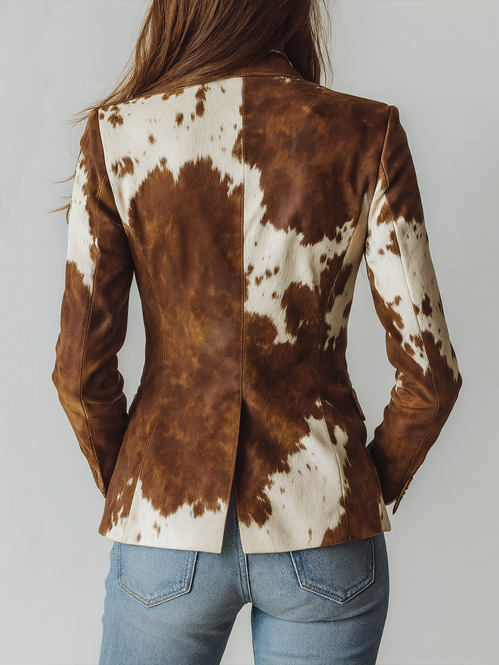 Back view of the brown cow print western blazer