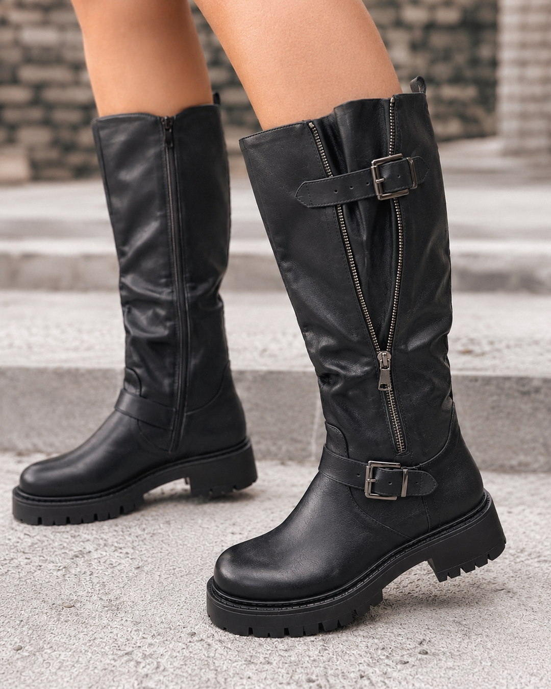 Women's wide calf boots in black, knee high with side zipper and buckle strap