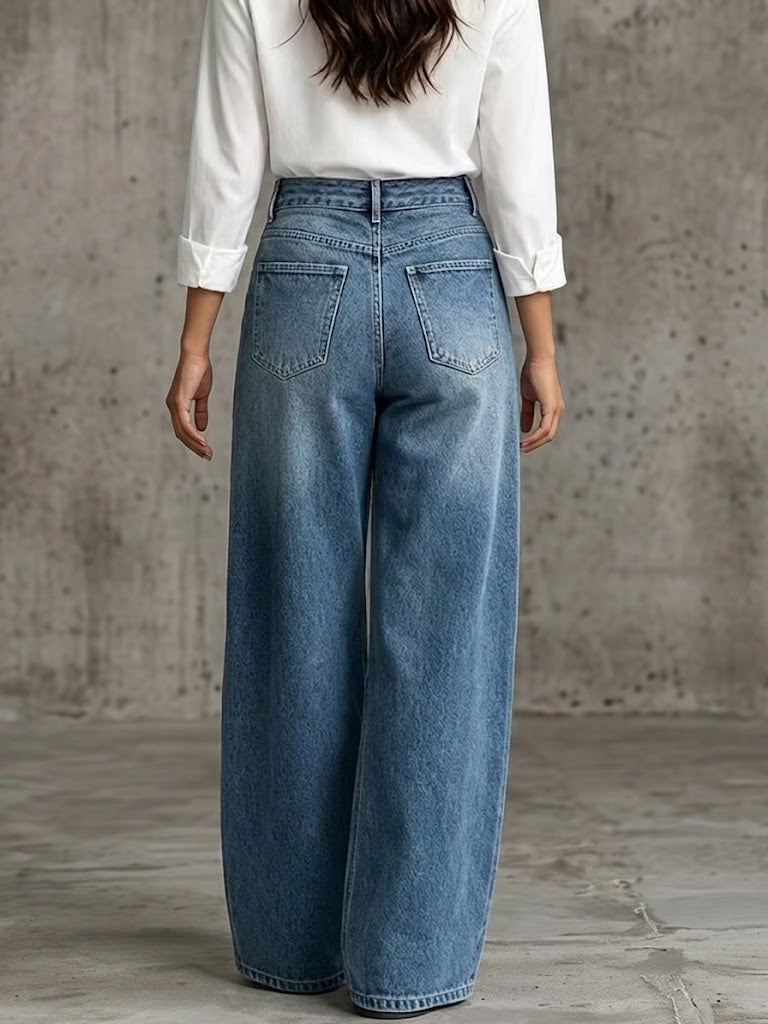 Back view of the blue wide leg pants with high rise and patch pockets